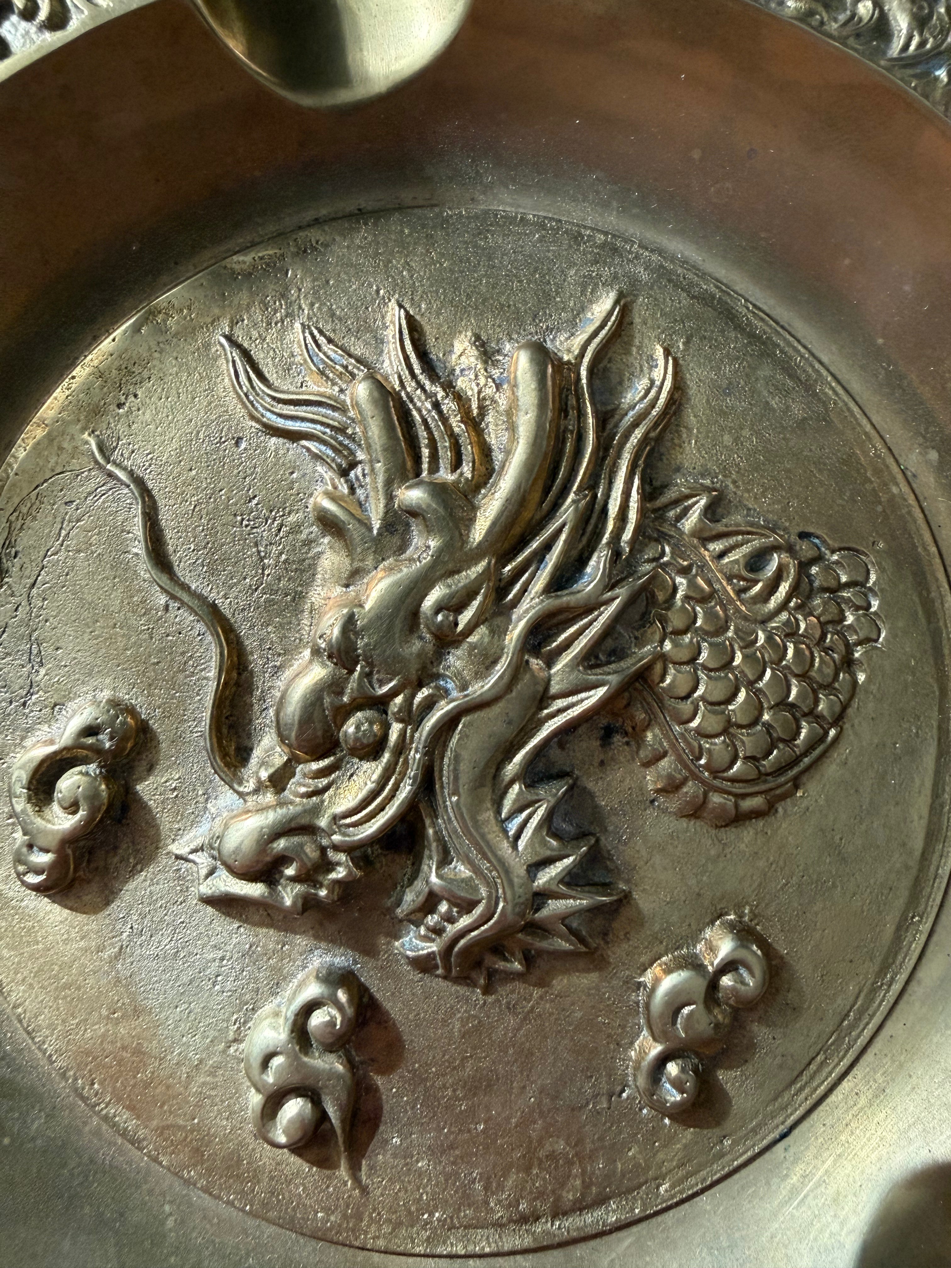 Bronze mirror with dragon design