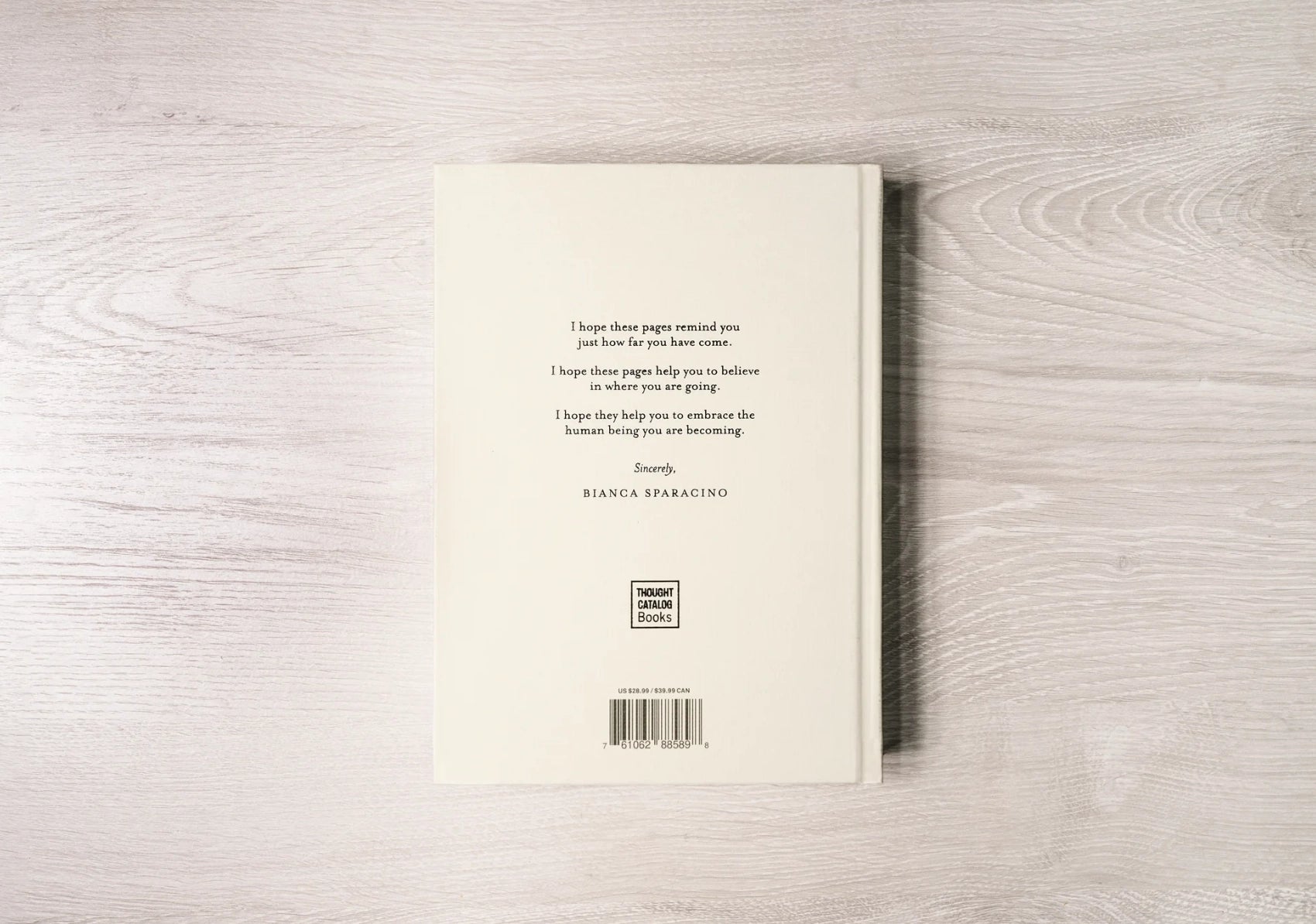 Book with text on a wooden surface