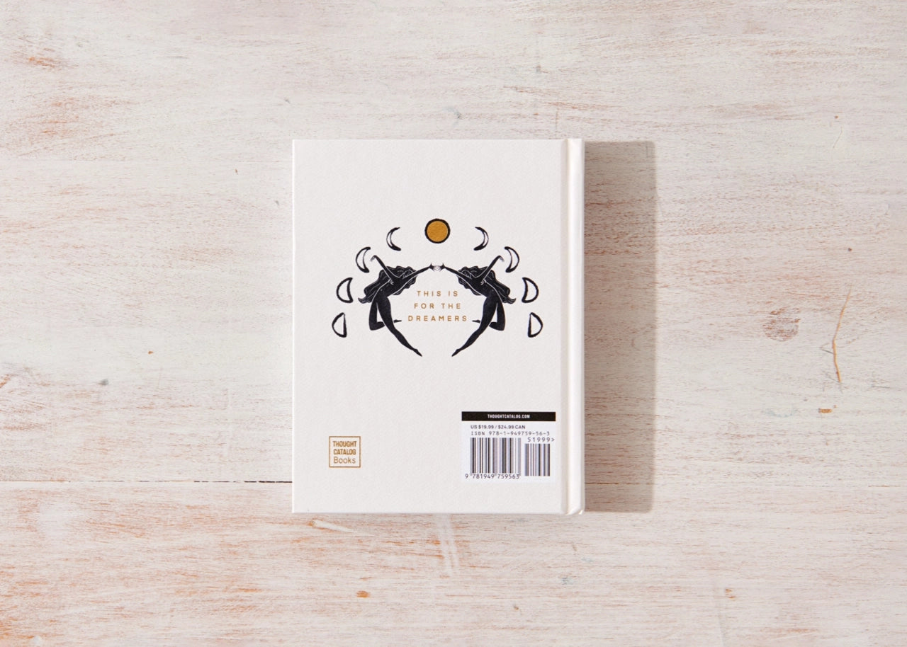 Book with a cover design on a wooden surface