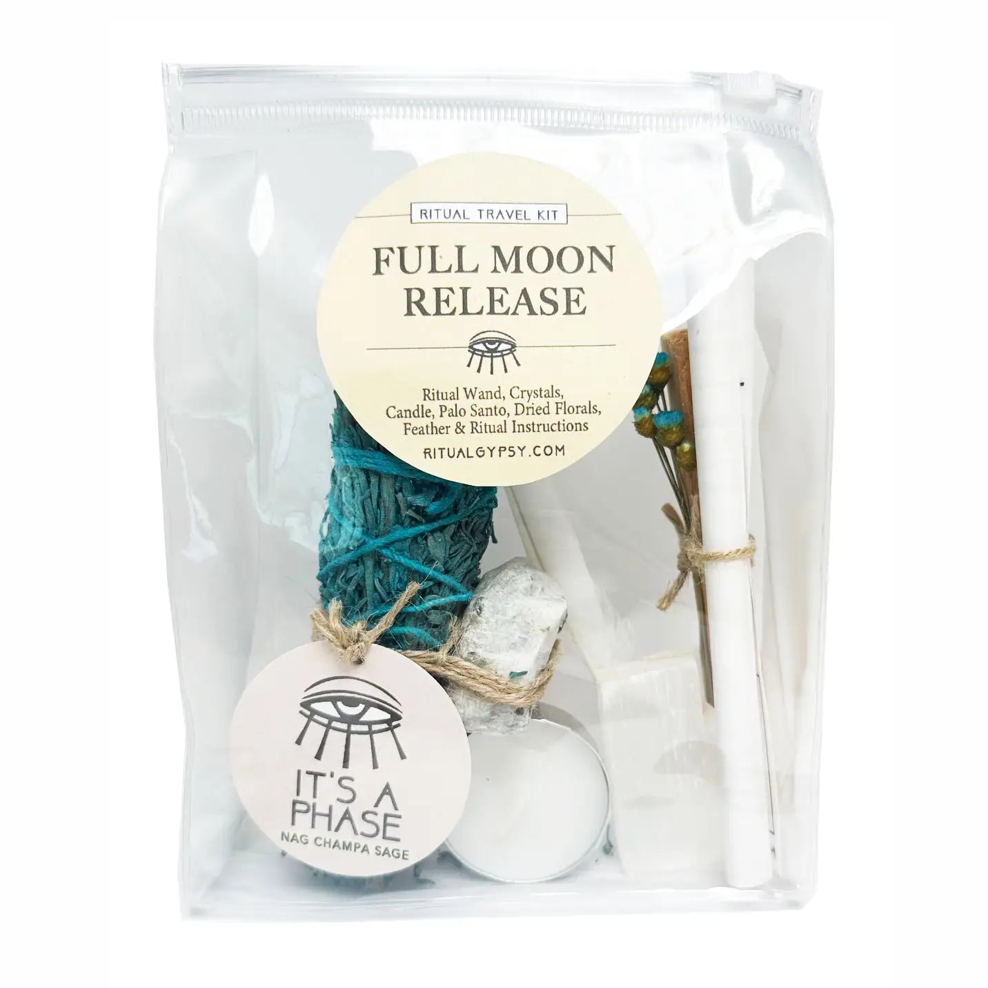 Ritual travel kit labeled 'Full Moon Release' with sage, crystals, and other items in a clear package.