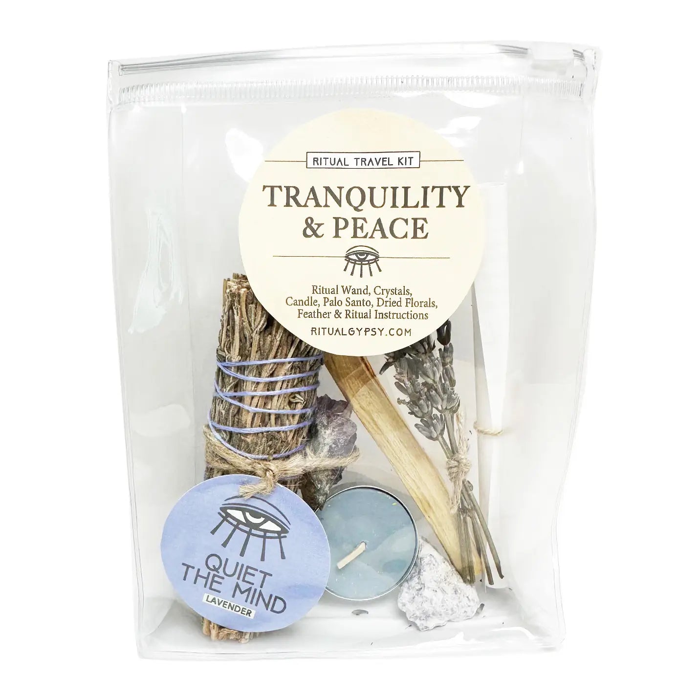 Ritual travel kit labeled 'Tranquility & Peace' with various items including a candle, feather, and crystals.